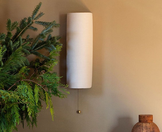 An alternative image of Shaded Vault Sconce in use